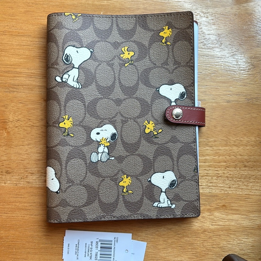 Coach X Peanuts Notebook In Signature Canvas With Snoopy Woodstock Print